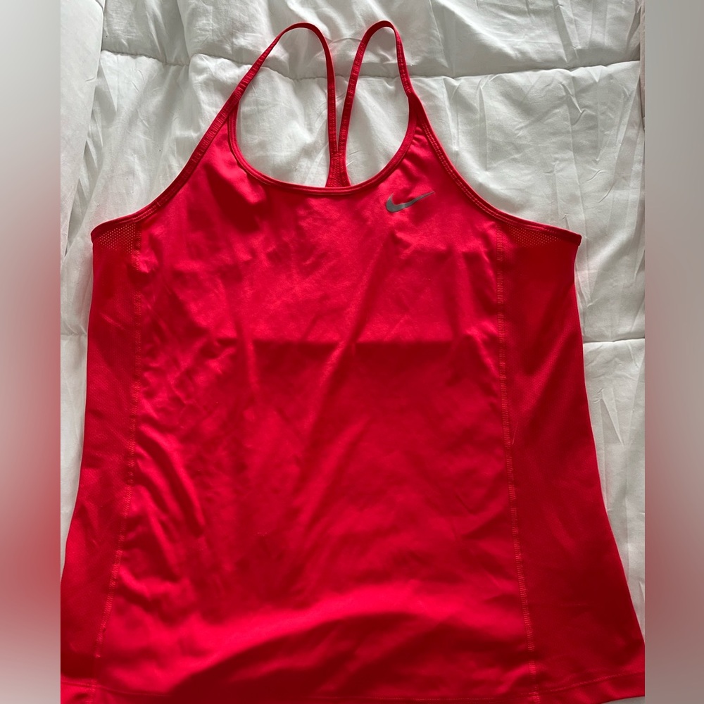 Gently worn Nike Dri-fit Strappy Workout Tank. Sze XL Tangerine color
